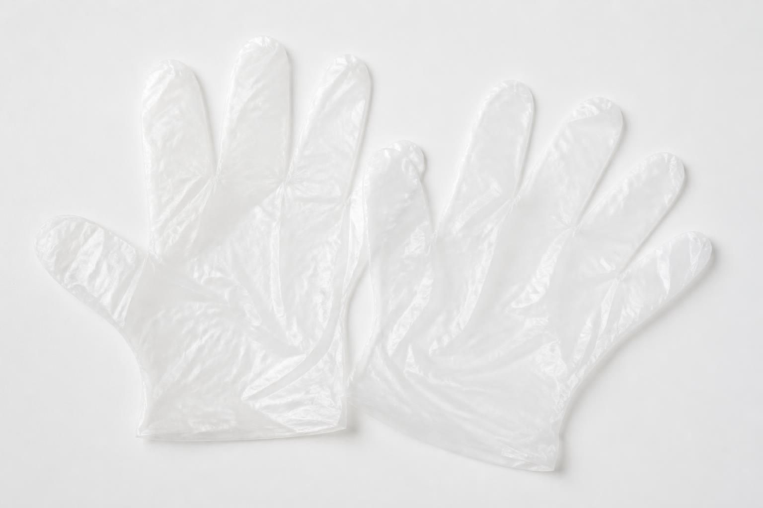 Basic gloves displayed on a clean white studio surface